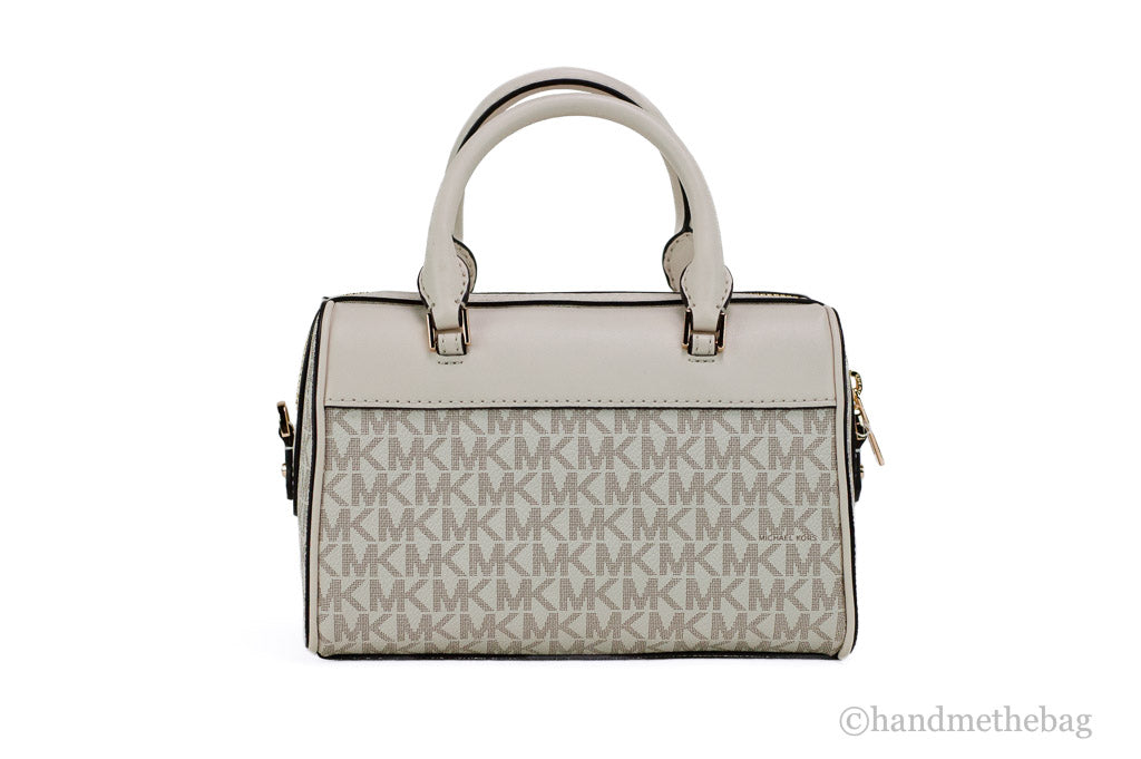 Bolso Bandolera Michael Kors Travel XS de PVC con Firma en Crema Claro y Estilo Duffle